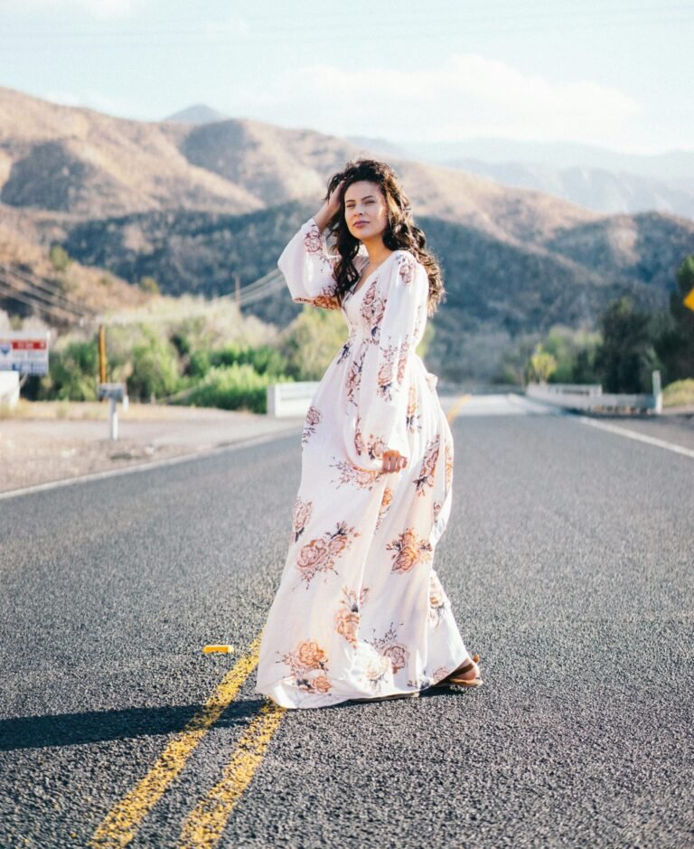 woman standing in the middle of the road